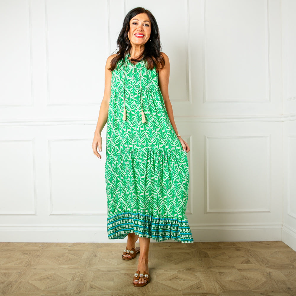 The green All Over Print Maxi Dress with a v neckline and a tassel tie detail around the neck